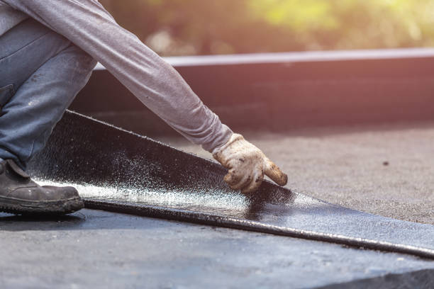 Professional Waterproofing technician working in Fair Oaks, VA